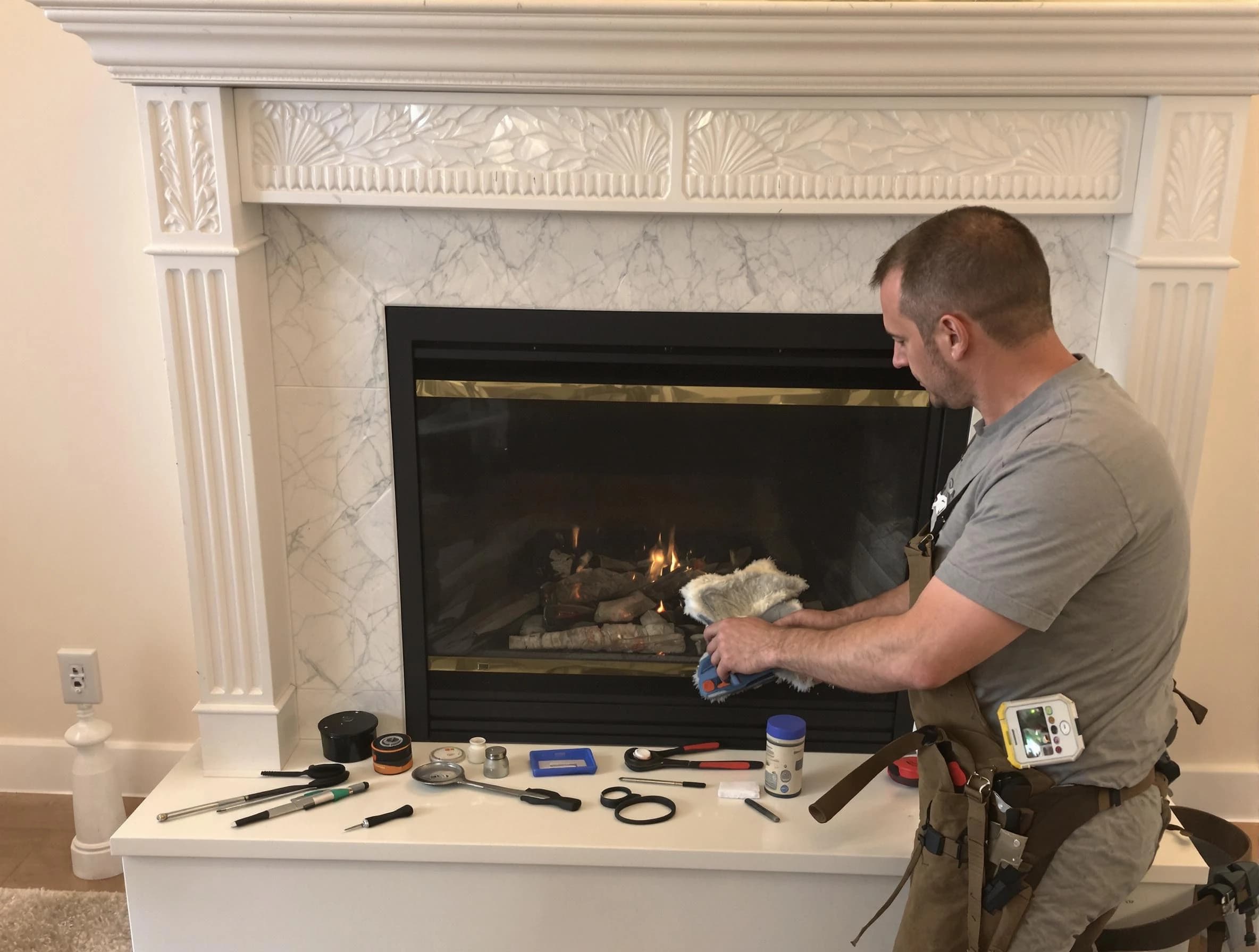 Stonecrest Chimney Sweep performing fireplace maintenance in Stonecrest, GA