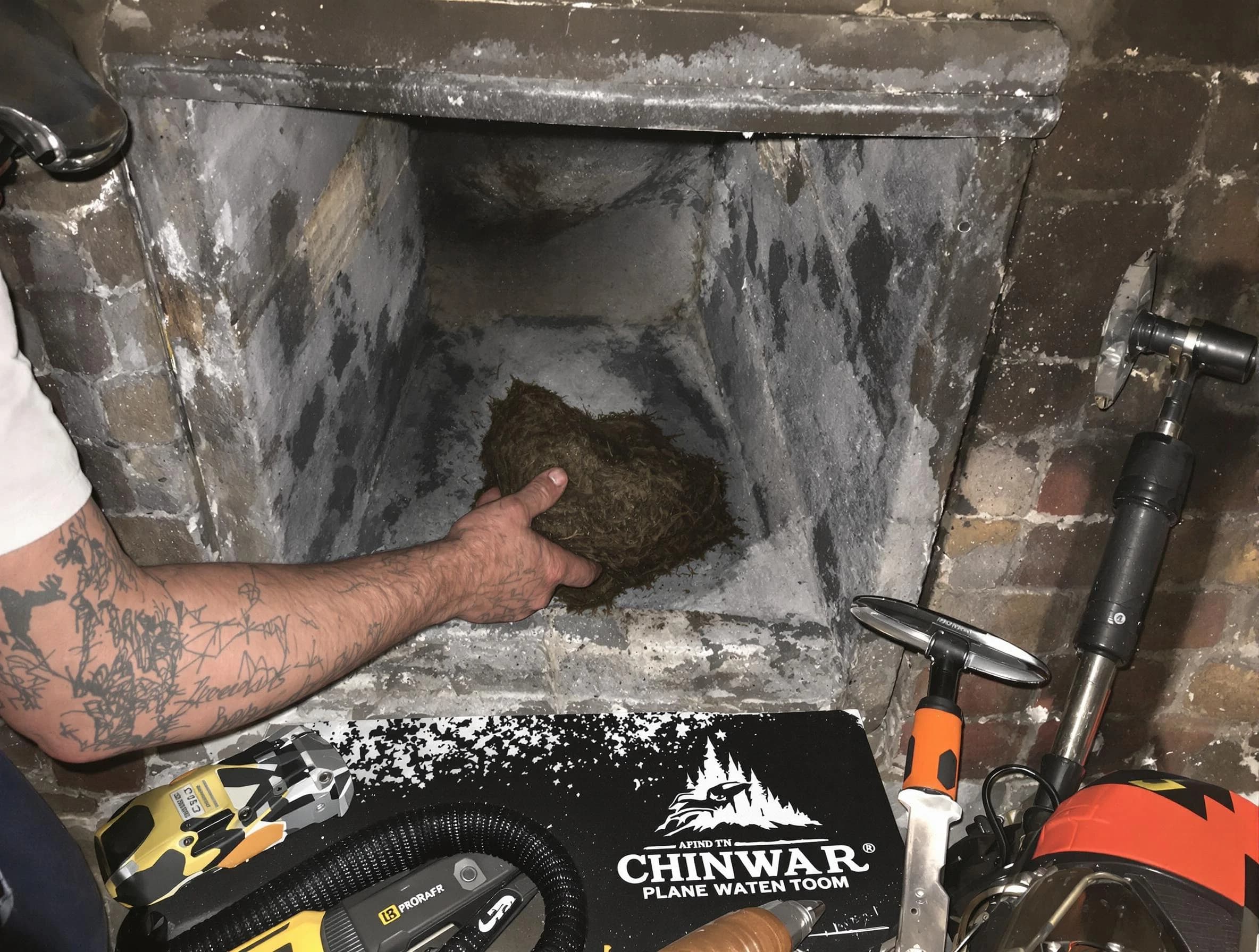 Stonecrest Chimney Sweep safely removing debris and screening chimney in Stonecrest, GA